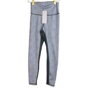 NWT Allfenix Anthropologie women’s powder cheetah 7/8 cropped legging size xs